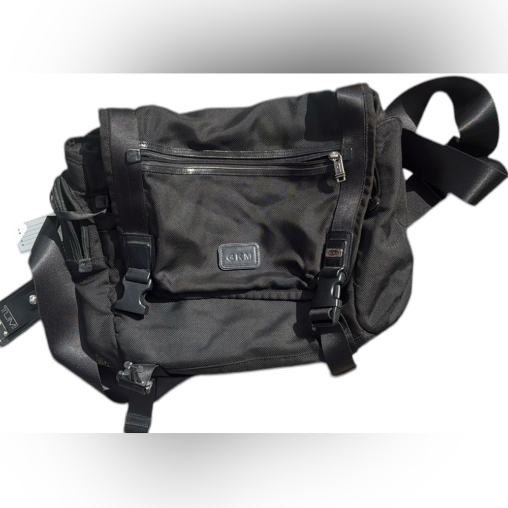 TUMI MESSENGER BAG.